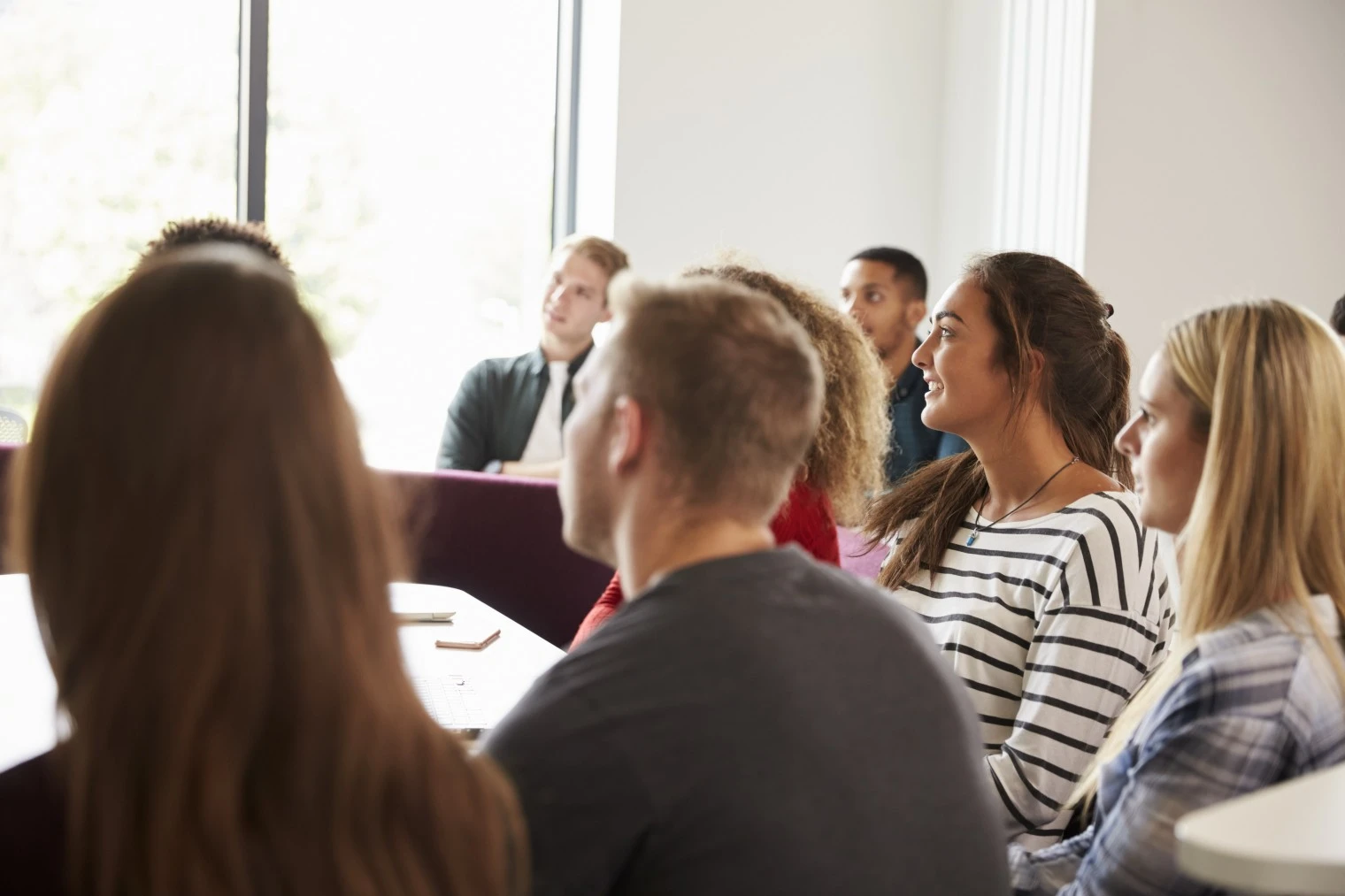 Group of professionals in workshop listening to training